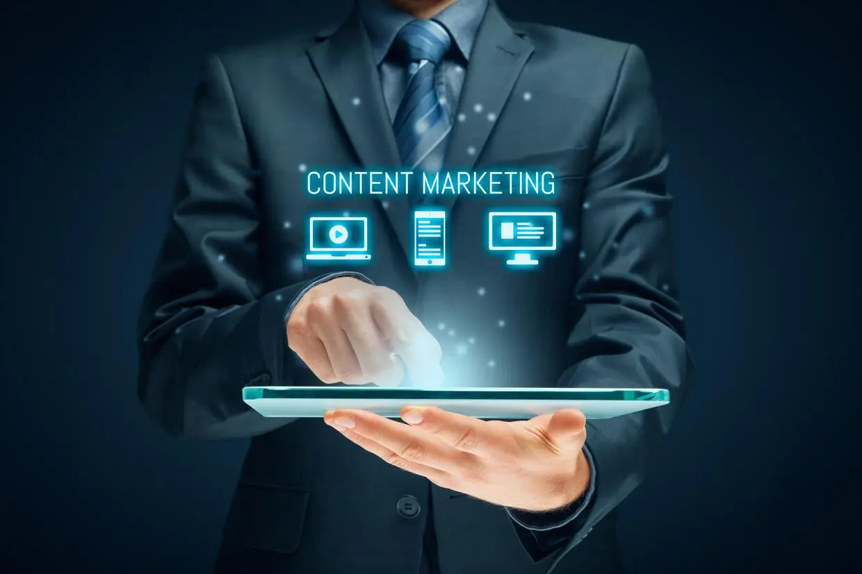 Digital marketing strategist holding a tablet