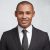 Successful prosperous businessman dressed formally, has good mood after signing profitable agreement with partners, rejoices terms of contract, isolated over white background. Career concept